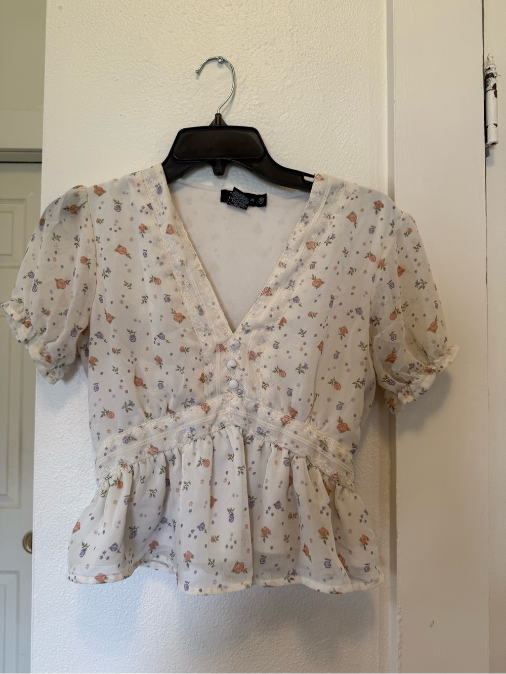 Floral V-Neck Peplum Blouse in Cream